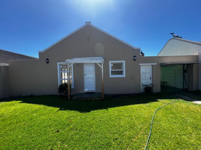 3-Bedroom House To Rent in Ottery with Pool, Garage, and Outdoor Patio.