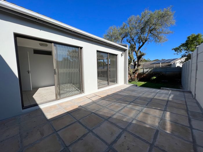 4-Bedroom House To Rent in Table View with garden, parking, and close amenities.