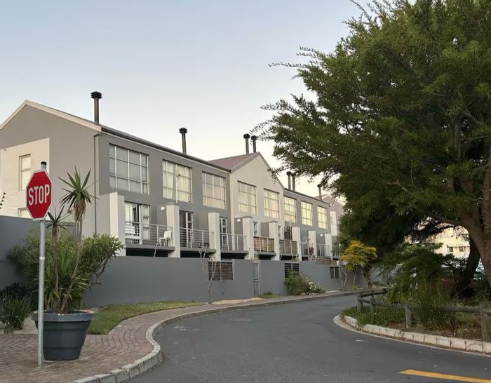 1-Bedroom Apartment To Rent in Parklands, includes parking, furnished, near amenities.