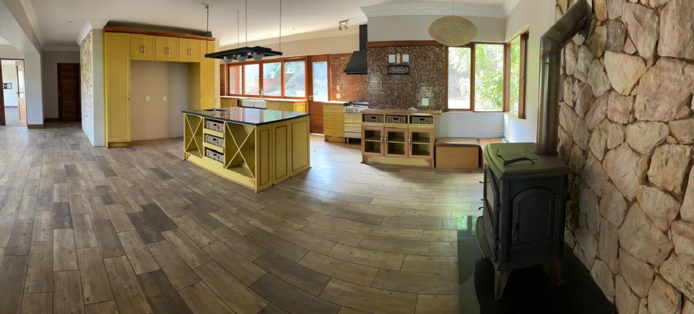 Entertainers kitchen with wine racks and pantry