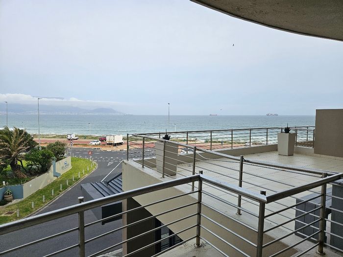 2-Bedroom Apartment To Rent in Table View with balcony and secure parking.