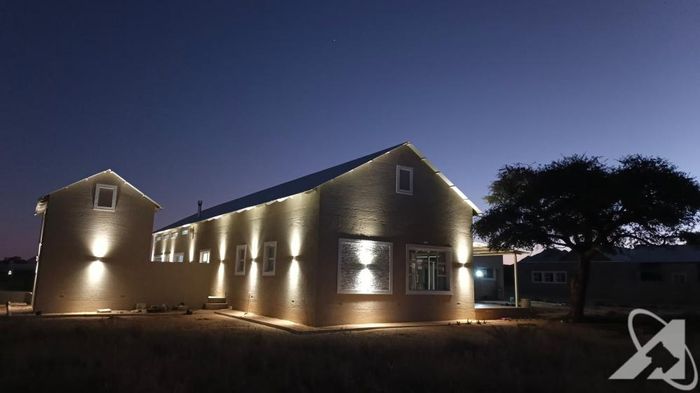 Spacious 5-bedroom house with braai, study, and 3 garages in Omeya Golf Estate. For Sale.