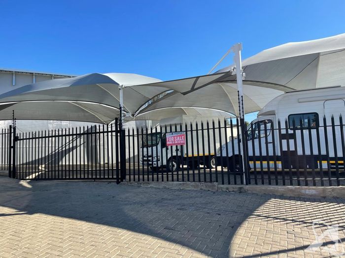 For Sale: Business in Windhoek West with showroom, offices, workshop, and carports.