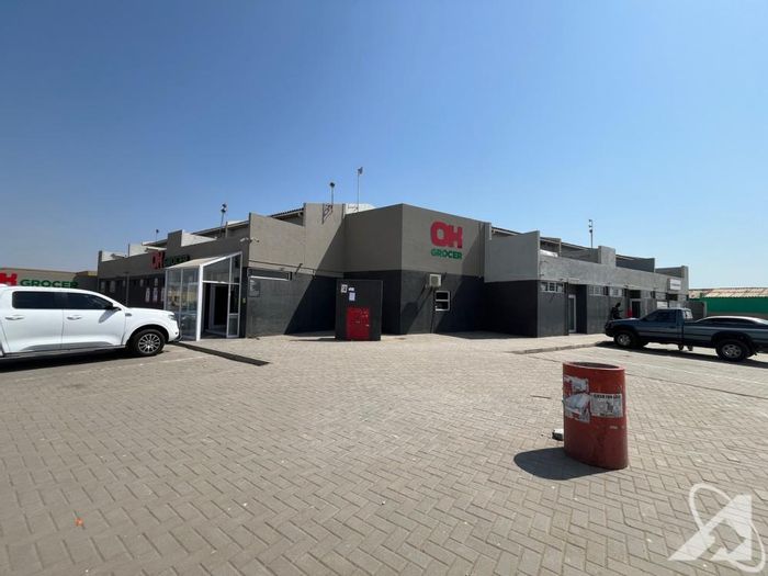 For Sale: Business in Kuisebmond with supermarket, commercial units, and flats.