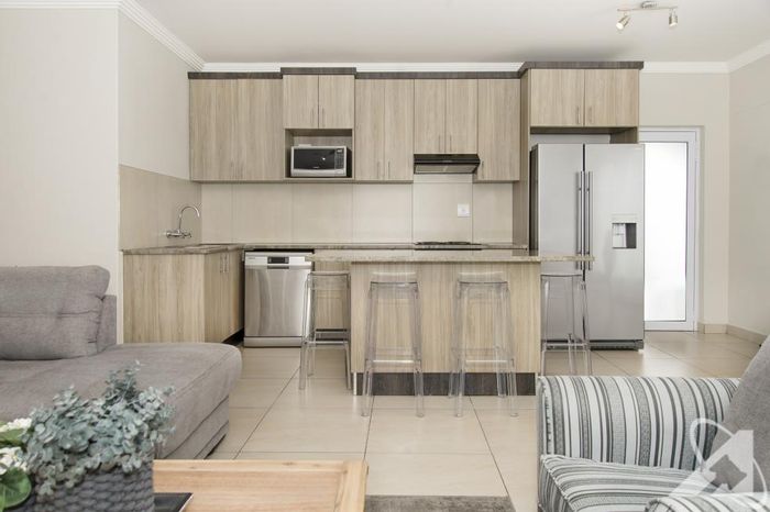 For Sale: 3-Bedroom Apartment in Pioniers Park with private courtyard and parking.