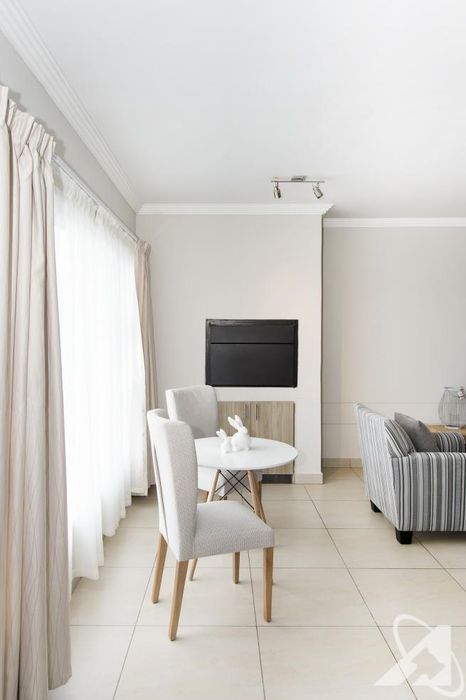 For Sale: 2-Bedroom Apartment in Pioniers Park with private courtyard and parking.