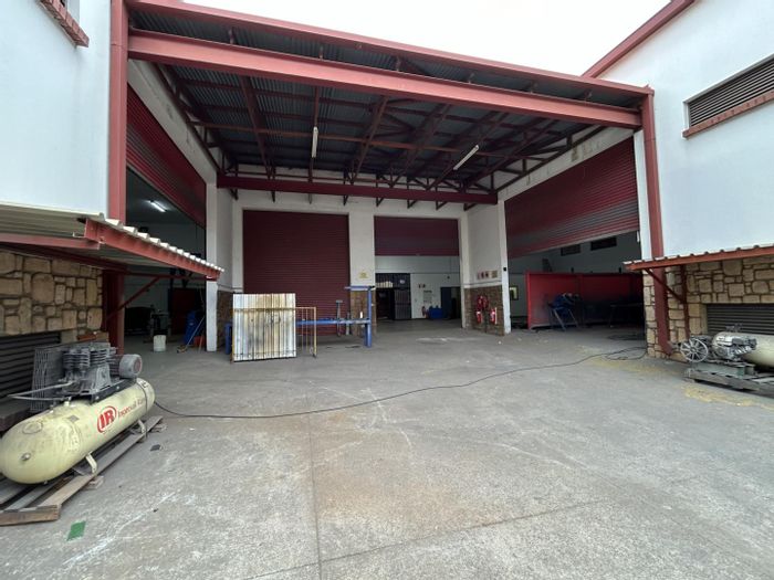 Industrial warehouse to rent in Highveld with roller doors and three-phase power.