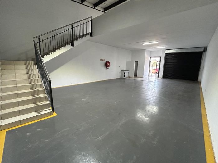 Industrial unit for sale in Spartan, featuring roller door, office space, and security.