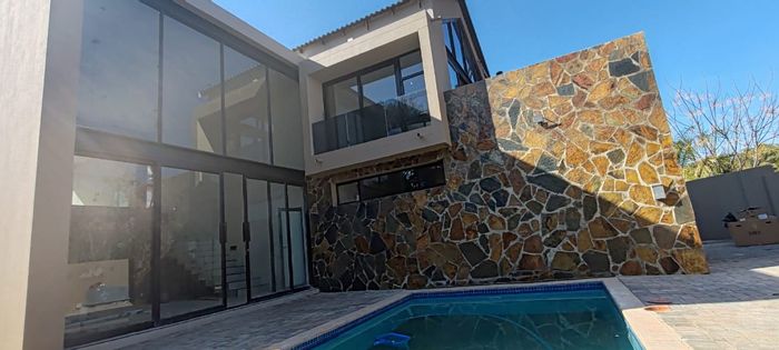 House To Rent in Kosmos Ridge: 4 bedrooms, en-suites, semi-smart features, scenic views.