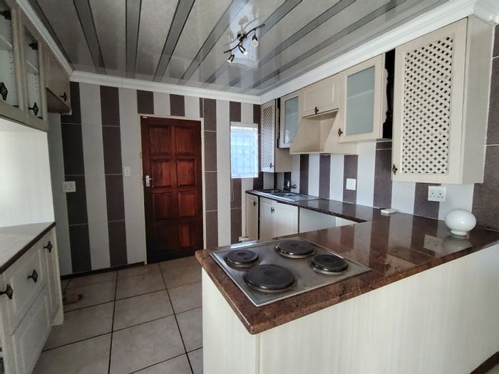 Spacious 4-bedroom house with potential flat for sale in Mandela View.