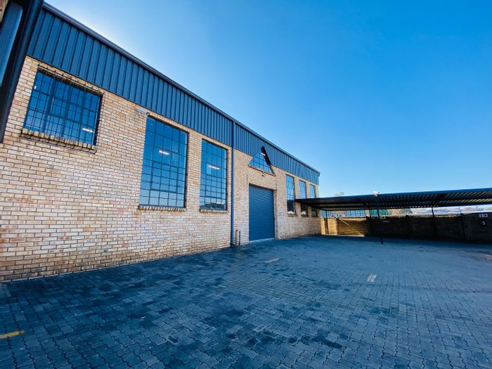 Industrial unit to rent in Laser Park with office space, security, and storage.