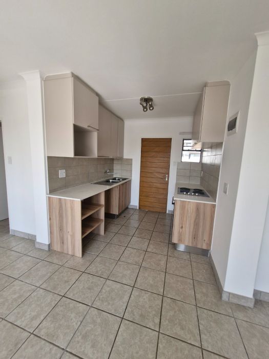 4-bedroom apartment to rent in Esther Park with clubhouse, pool, and play areas.