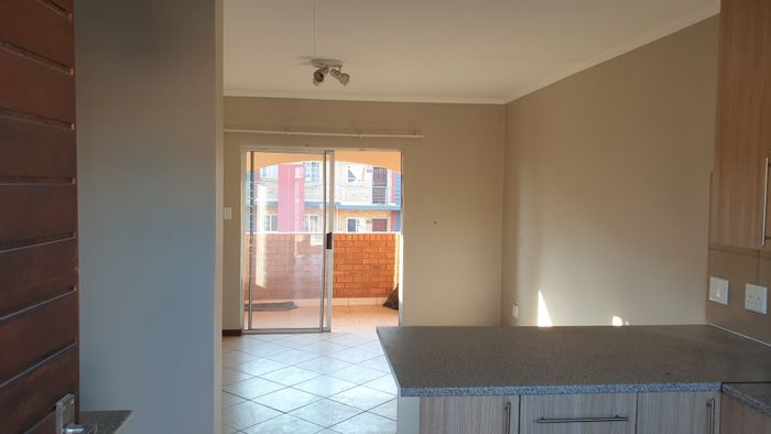 2-Bedroom Apartment For Sale in Monavoni with security, parking, and balcony access.