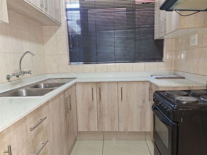Townhouse For Sale in Benoni Central: Spacious layout, study, guest loo, and granny flat.
