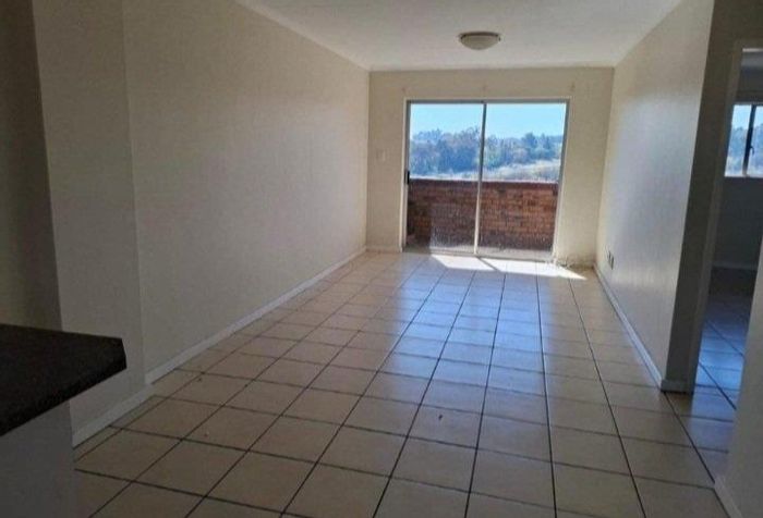 2-Bedroom Apartment For Sale in Zwartkop with Lake Views and Private Garage.