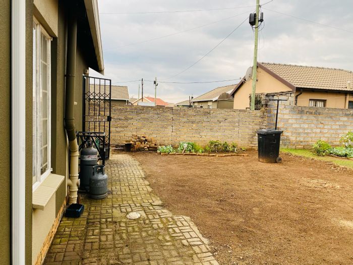 2-Bedroom House in Savanna City For Sale, features yard space and CCTV security.