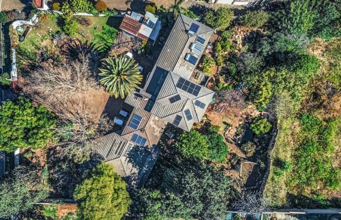 For Sale: House in Bedfordview Central with solar power, borehole water, and expansive gardens.