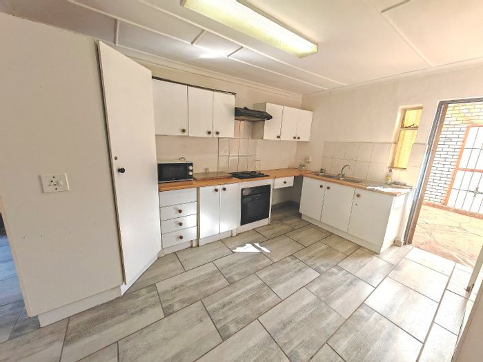 For Sale: Brandwag House with 10 bedrooms, dual kitchens, and student rental potential.