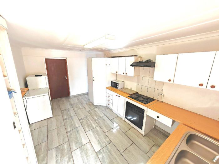 For Sale: Brandwag House with 10 bedrooms, dual kitchens, and income potential.