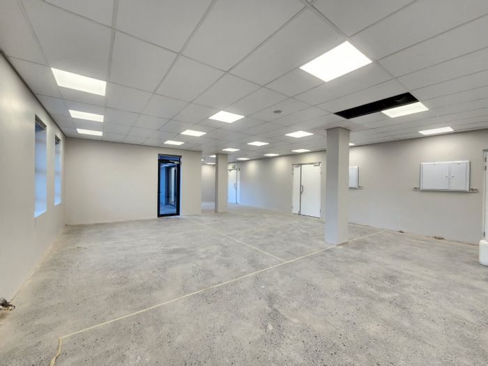 To Rent: Customizable 296m² medical suite in secure Paardevlei estate, 9 parking bays.