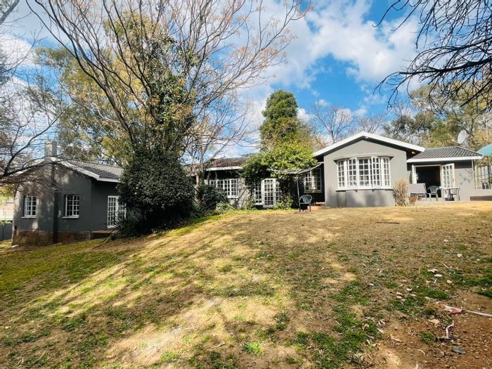 For Sale: Spacious 4-Bedroom House in Douglasdale with Staff Accommodation and Outdoor Space.