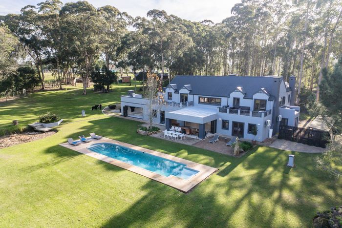 Versatile Plettenberg Bay Rural farm for sale with multiple outbuildings and water sources.