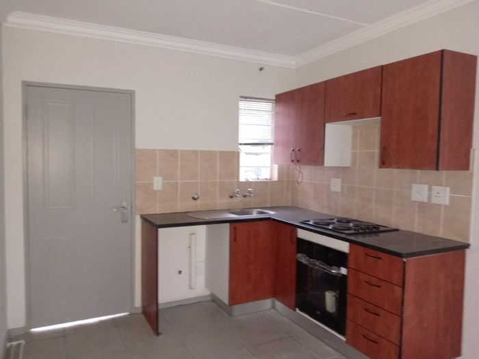 For Sale: 2-Bedroom Apartment in Klippoortje, close to amenities, secure complex.