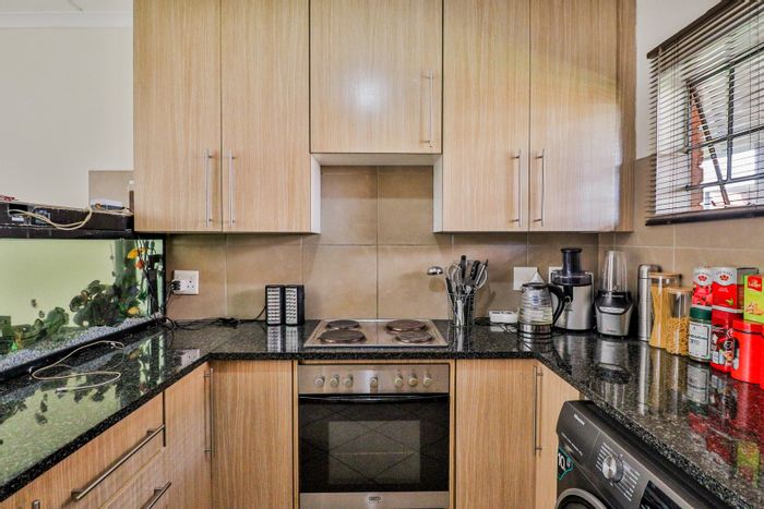 For Sale: Tenanted Apartment in Noordwyk with pool, security, and parking.