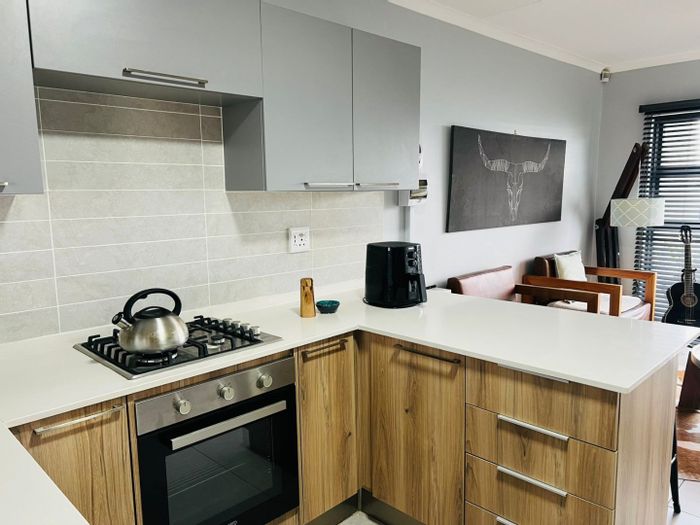 For Sale: Apartment in Modderfontein with tenant, gym, pool, and nature reserve access.