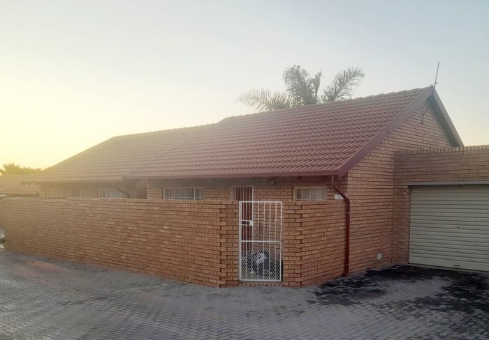 For Sale: 2-Bedroom Townhouse in The Reeds with pool, garden, and secure parking.