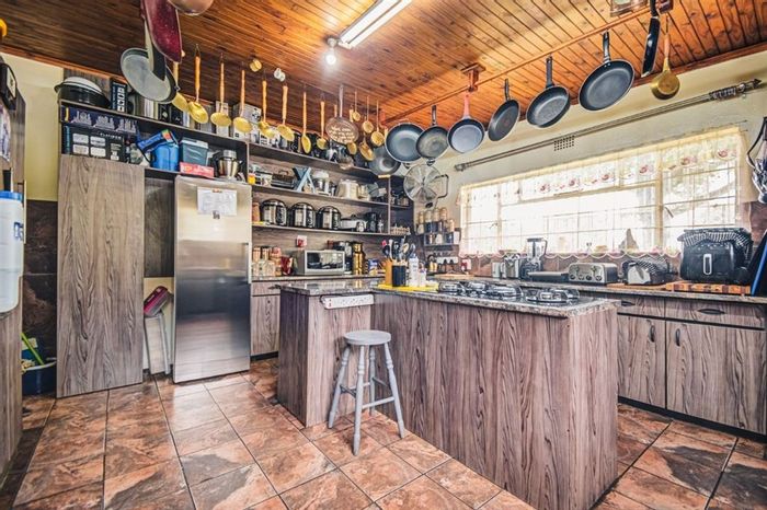 Bredell Commercial Property For Sale: 10 bedrooms, 4 kitchens, 3 flats, pool.