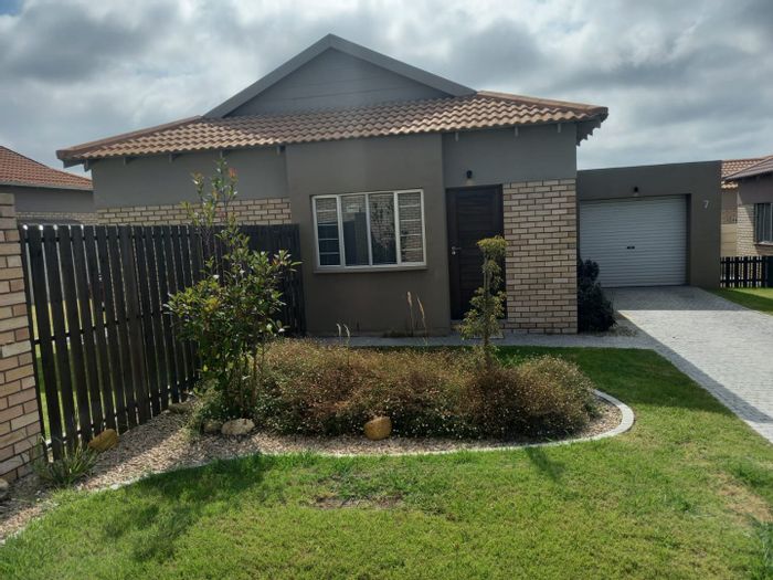 For Sale: House in Mooikloof Country Estate with rental income and secure garden.