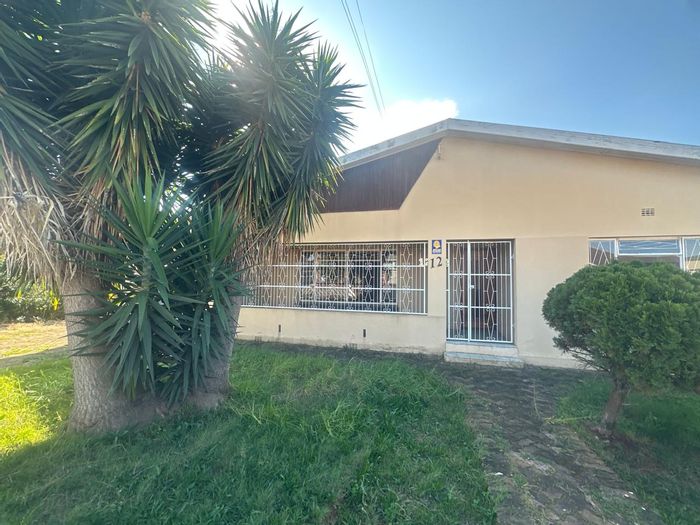House for Sale in Bothasrus: 3 Bedrooms, large garden, dual garages, near schools.