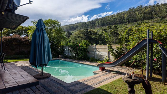 For Sale: Spacious Sedgefield Central house with pool, guest suite, and garden.