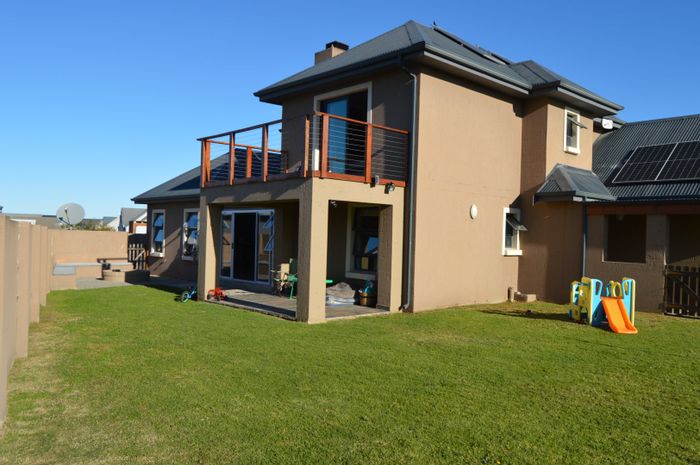 For Sale: House in Blue Mountain Village with solar power, garden, and spacious layout.