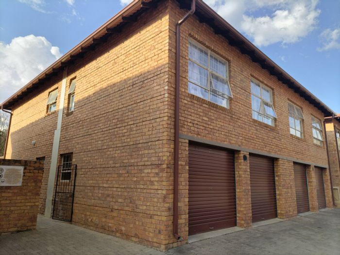 4-Bedroom Townhouse To Rent in Hazeldean with garden, security, and schools nearby.
