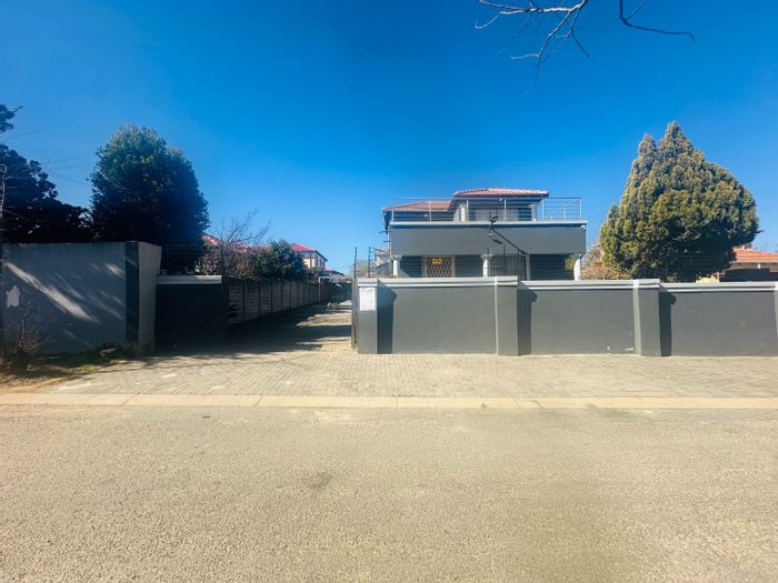 For Sale: 3 Bedroom House in Cosmo City with ample parking and kids' play areas.