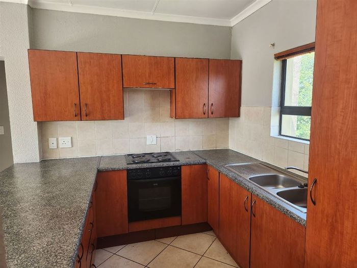 2-Bedroom Apartment in Jansenpark For Sale with Pool and Carport.