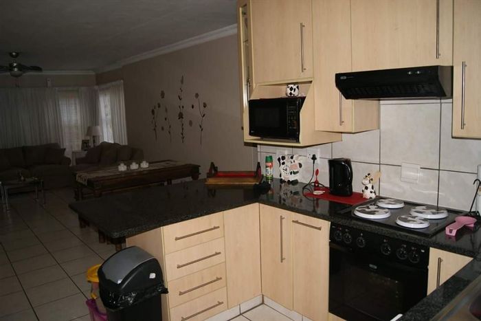 Nimrod Park Townhouse For Sale: 2 Bedrooms, secure garage, low-maintenance living.