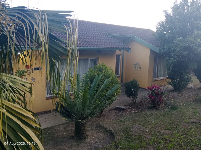 Northdale House For Sale: 3 Bedrooms, spacious yard, open-concept living, endless potential.