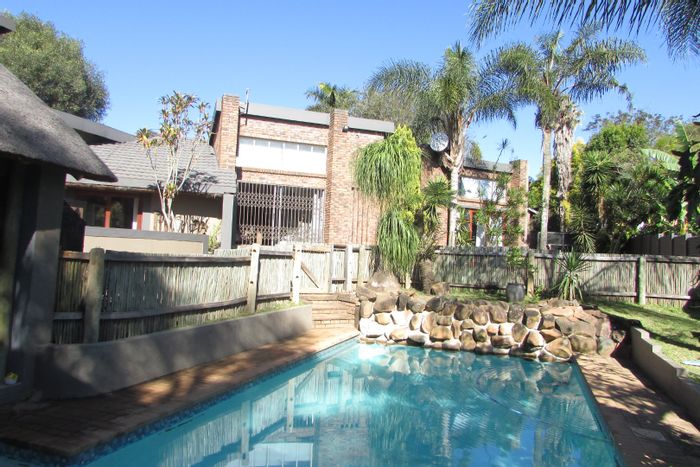 For Sale: 4-Bedroom House in White River Ext 9 with flatlet, pool, and garages.