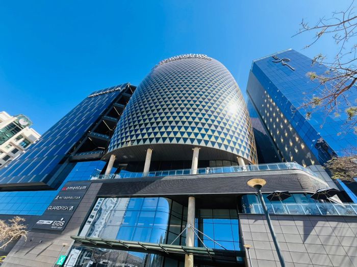 Prime 313 sqm office space to rent in Sandton Central, eco-friendly design.