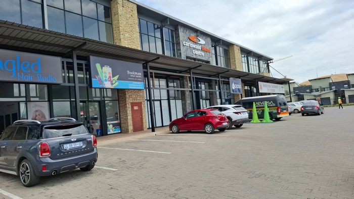 Commercial Retail Center To Rent in Carlswald with diverse shops and ample parking.