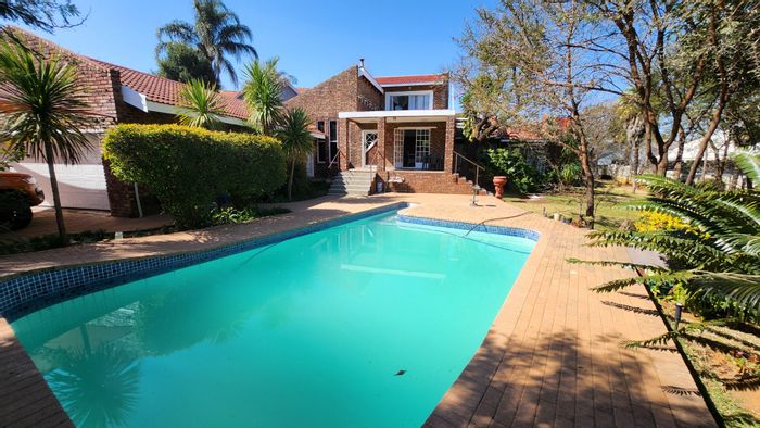 For Sale: Spacious 4-bedroom house in Wilkoppies with pool and double garage.