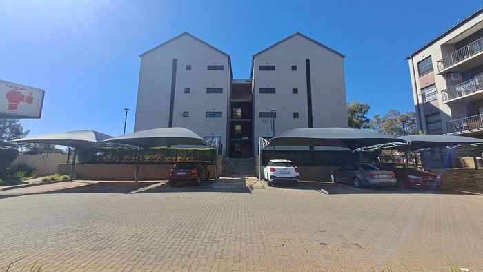 2-Bedroom Apartment in Clubview with Security, Parking, and Prime Location For Sale.