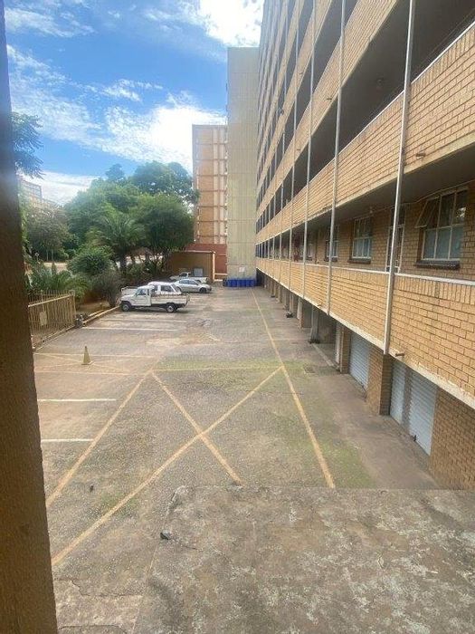 2.5-Bedroom Apartment For Sale in Pretoria Central – Income Potential, Secure Parking.