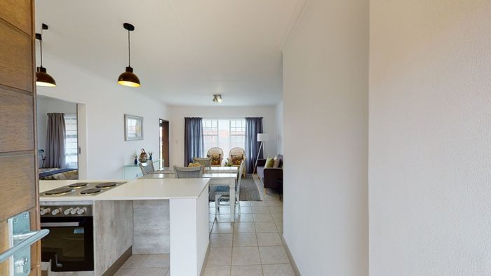 For Sale: 3-Bedroom Apartment in Monavoni with Private Garden and Security Access.