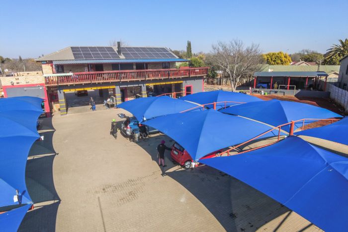 Commercial property in Wilkoppies for sale: liquor license, wash bays, solar power.
