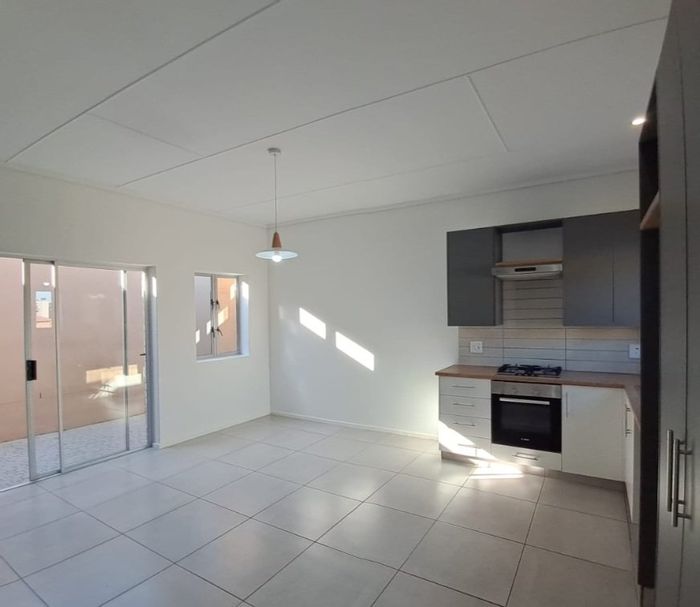 House For Sale in Mooikloof Country Estate: Security, parks, and energy-efficient features.