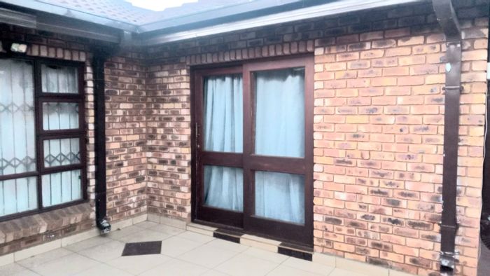 For Sale: House in Doornpoort with 4 bedrooms, triple garage, and lapa.